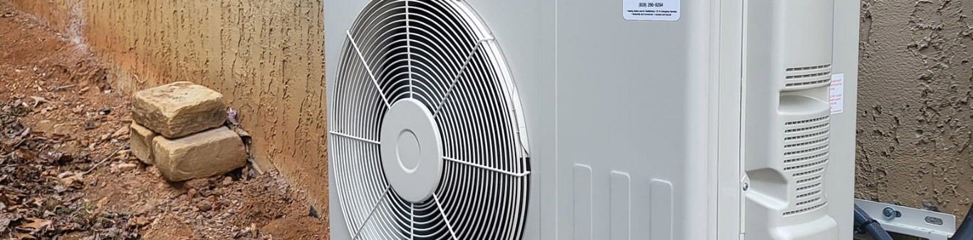 Heating and air conditioner unit outside house Fletcher NC